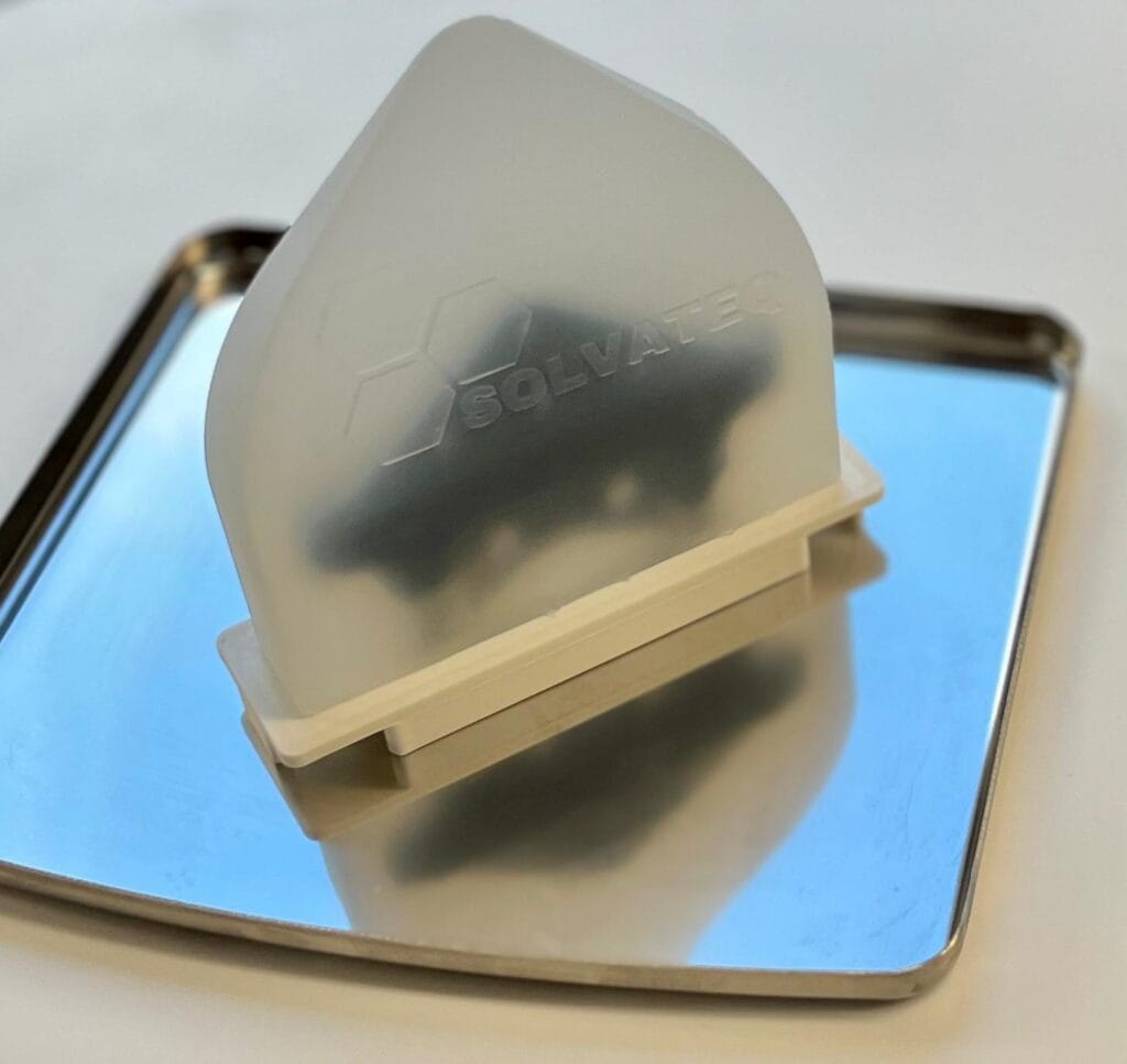 Racloir en silicone de forme triangulaire